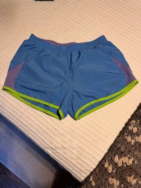 Nike Women’s Blue Athletic Shorts with Lime Trim